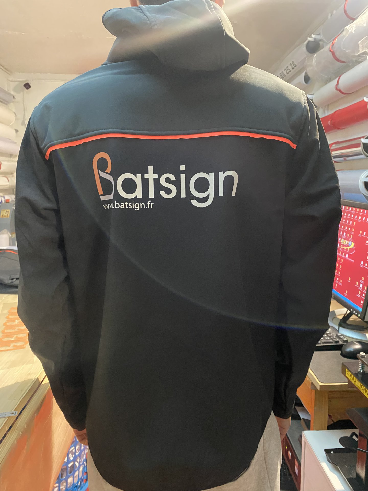 Flocage de logos de sociétés sur vêtements